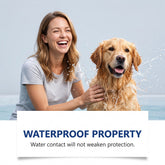 A woman smiling and petting a wet golden retriever with water splashing around them, with a white text banner at the bottom reading &