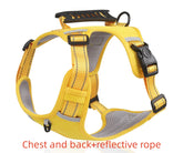 Yellow reflective dog harness with gray mesh padding and black plastic buckles, shown on a white background with red text at the bottom reading &