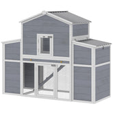 Two-level wooden chicken coop with gray and white color scheme on a white background
