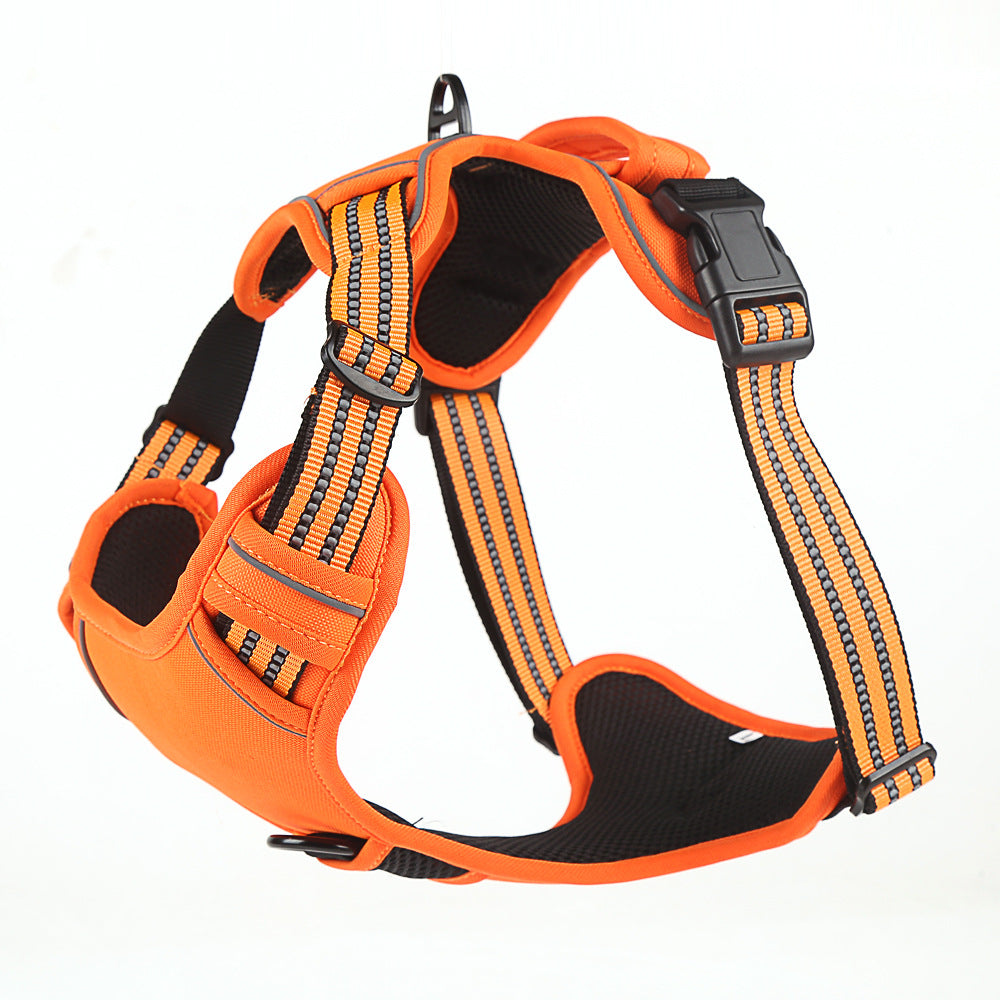An orange and black dog harness with reflective stripes, adjustable black plastic buckle, and a top hanging loop, shown on a plain white background.