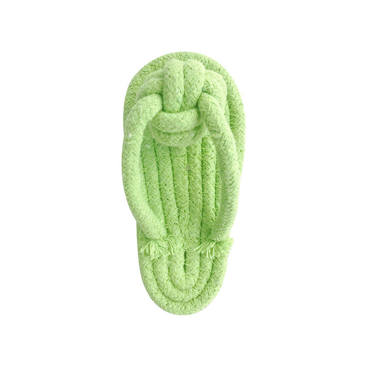 Green knitted slipper on a white background